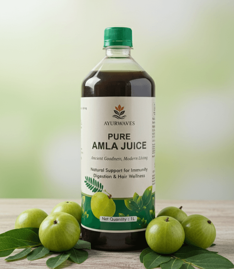 Cold Pressed Amla Juice from Ayurwaves in a bottle with fresh amla fruits and green leaves.