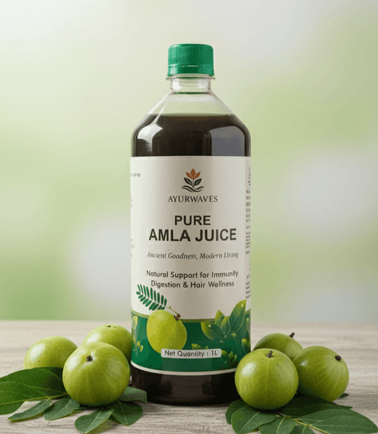 Cold Pressed Amla Juice from Ayurwaves in a bottle with fresh amla fruits and green leaves.